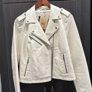 Rev up your style with this NWT women's faux leather moto jacket. Edgy and chic